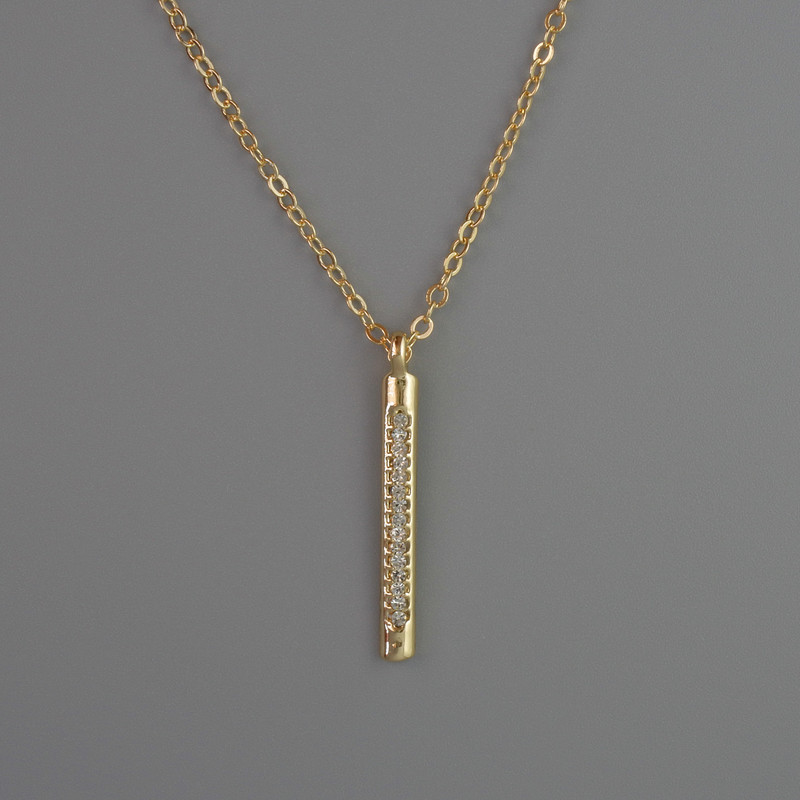 Pendant on a chain of gold-toned metal, diameter 26x3 mm, thickness 1 mm + -, length 40-45 cm +