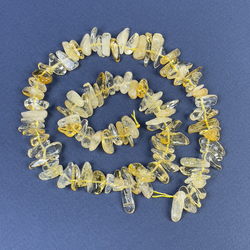 Citrine chip beads 12-17×3-5 mm on thread, length 42 cm+