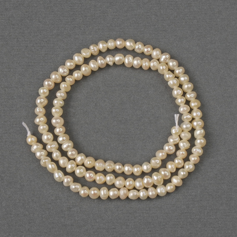 Beads of natural freshwater pearls, 3–3.5×3.5–4 mm, length 33 cm on a thread