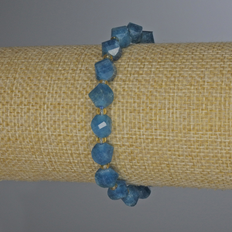 Bracelet with faceted apatite diamond shapes