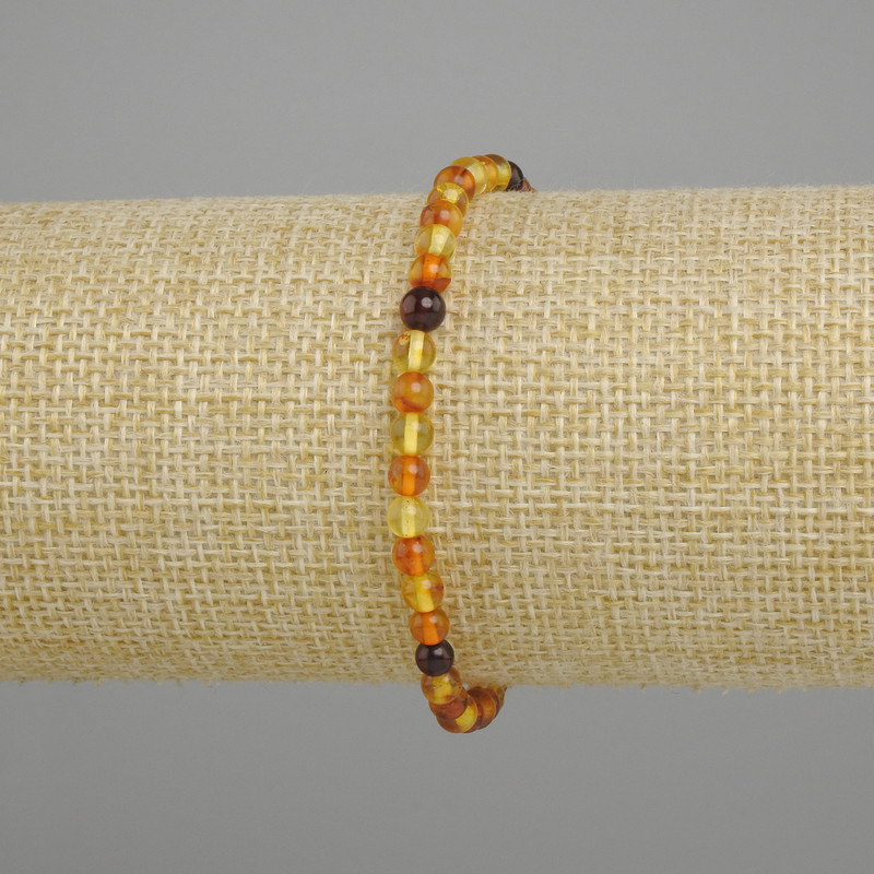 Amber bracelet smooth bead, diameter 4.5 mm ±, length 18 cm stretch