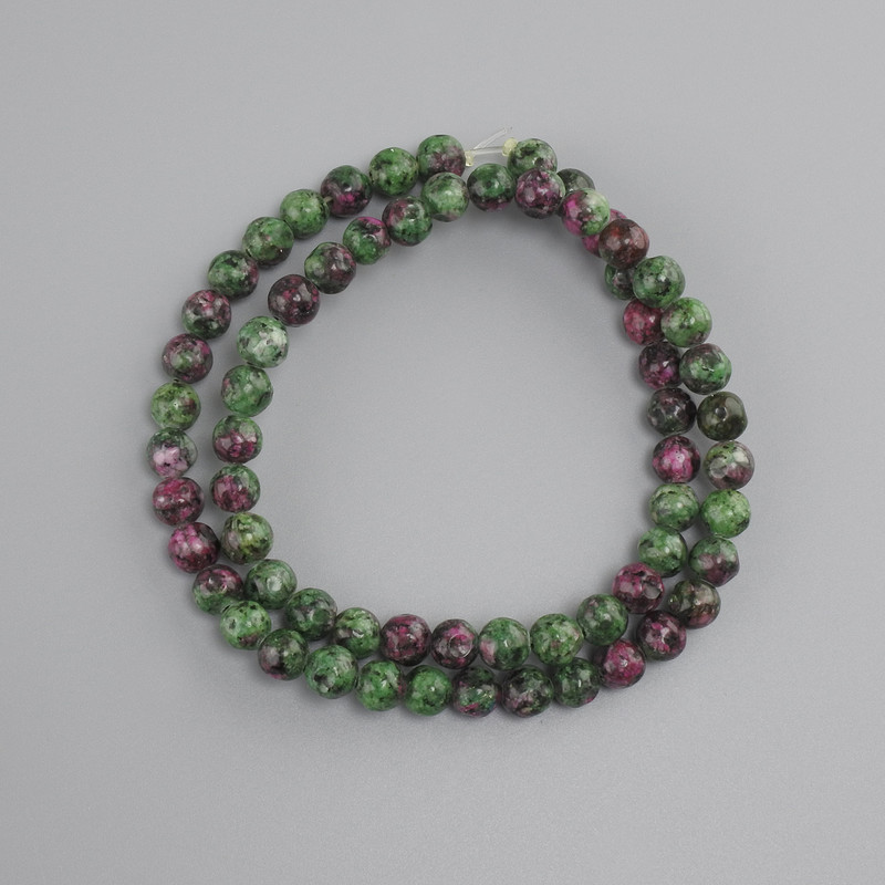 Zoisite Faceted Beads, round, 6 mm approx., 37 cm approx. strand on nylon thread