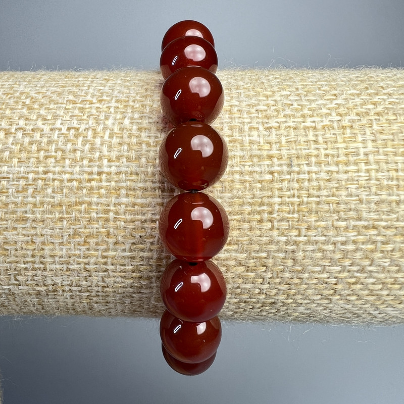 Bracelet with natural carnelian smooth beads, 10 mm diameter ±, length 18 cm ± (stretch)